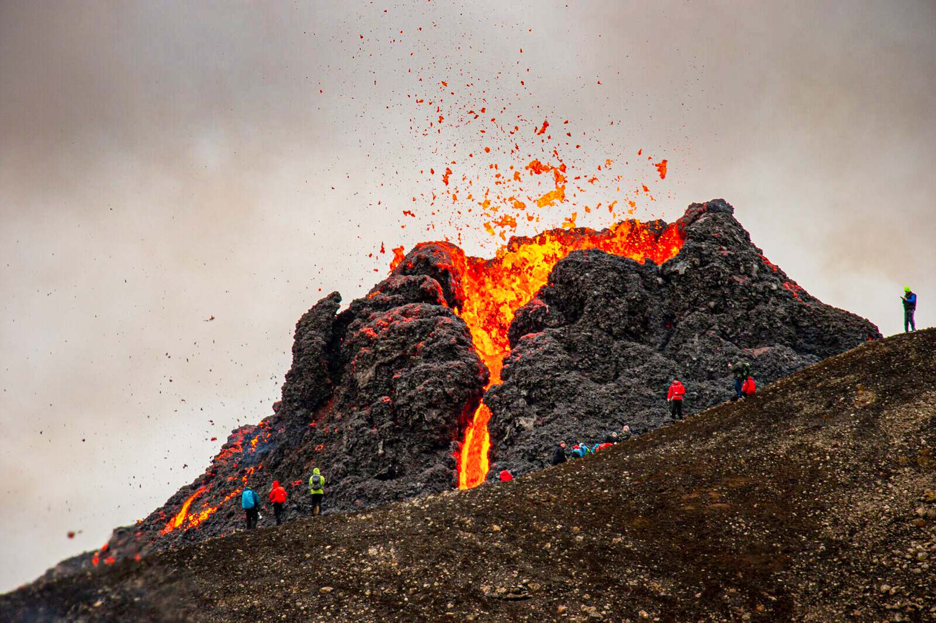 Erupting volcano during sunset